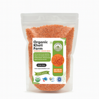 Close-up of vibrant red organic Masoor Malka Dal split lentils from Punjab farm, showcasing natural, unpolished grains for healthy cooking.