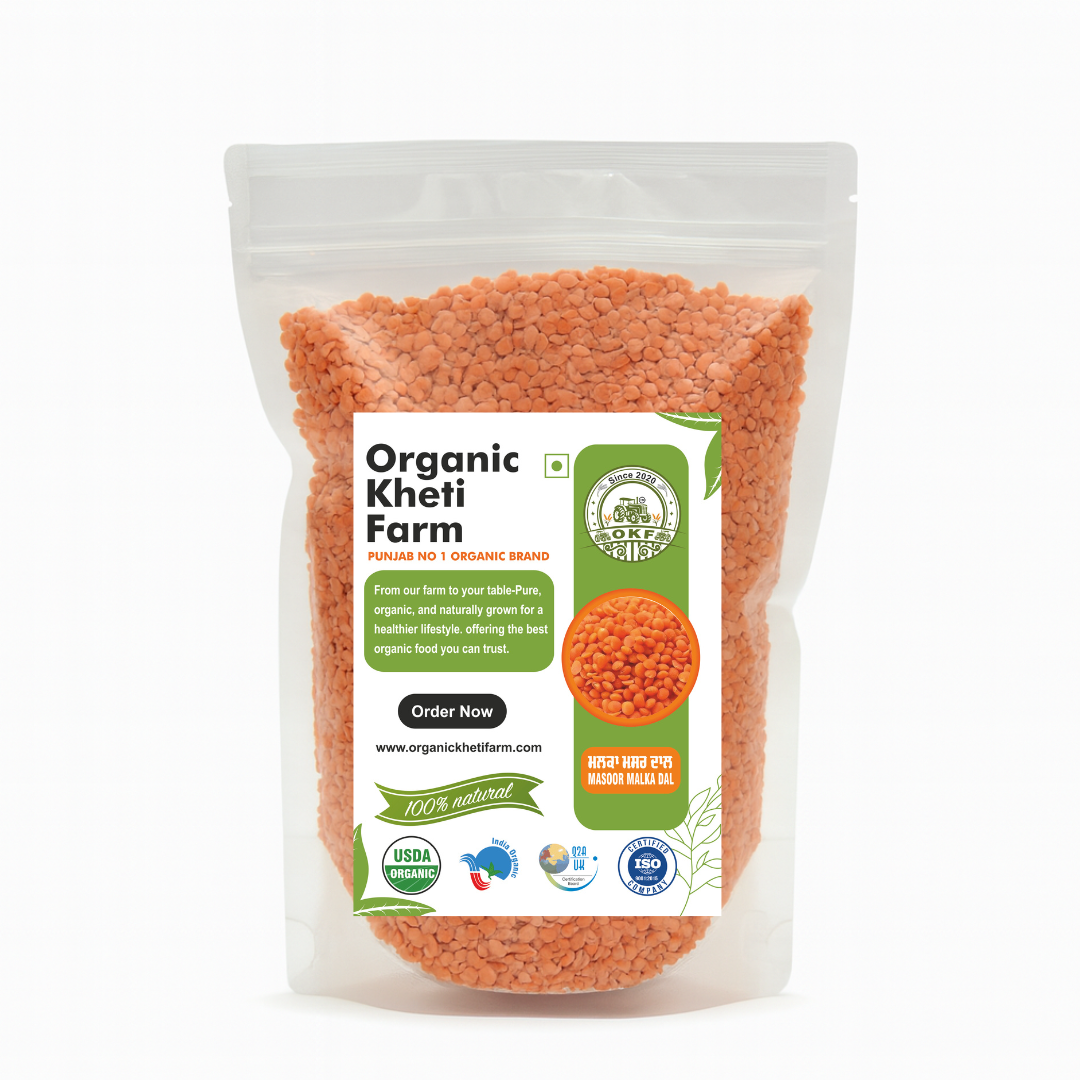 Close-up of vibrant red organic Masoor Malka Dal split lentils from Punjab farm, showcasing natural, unpolished grains for healthy cooking.