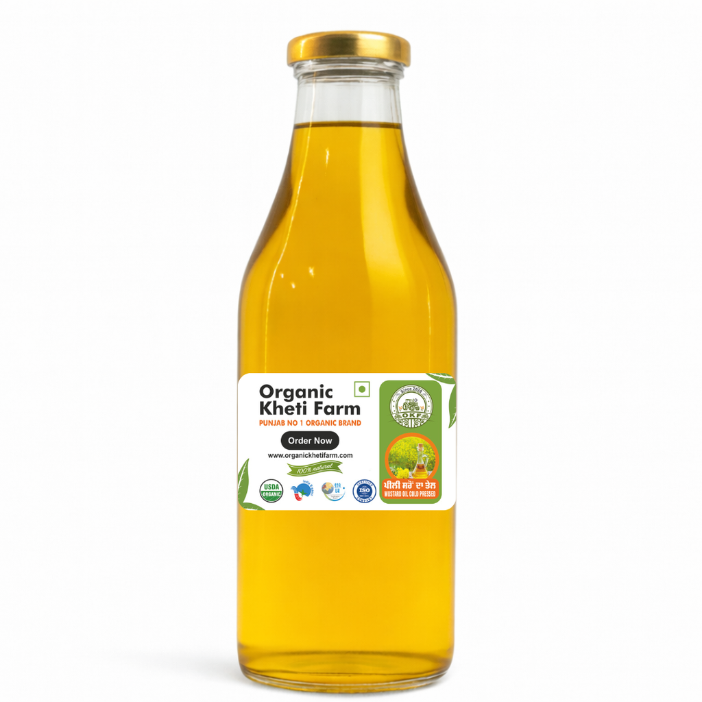 Close-up of organic yellow mustard seeds being cold-pressed into pure mustard oil from Punjab farm