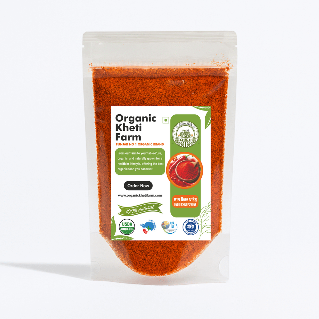 Bright red organic chili powder in a traditional Indian spice jar, sourced directly from Punjab farm for authentic flavor