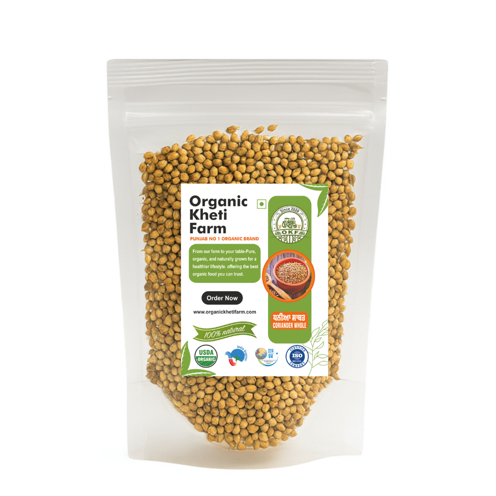 Close-up of organic whole coriander seeds from Punjab farm, showing their natural, unpolished appearance and aromatic quality