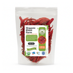 Close-up of vibrant red whole organic chillies from Punjab farm, sun-dried and fresh, ready for cooking and spice blends