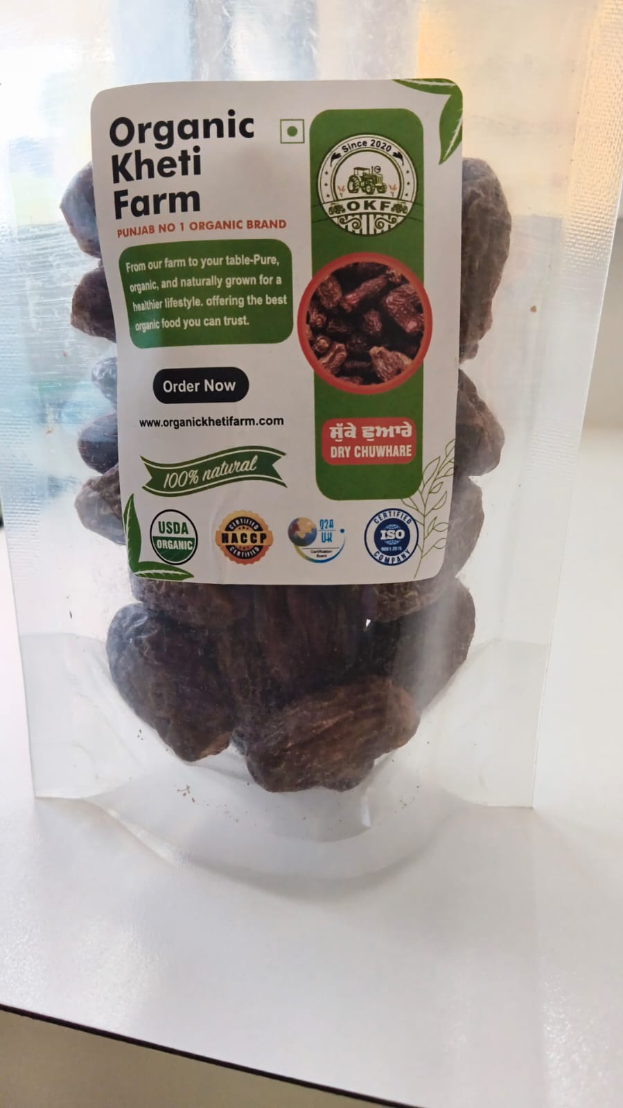 Close-up of organic dry chuware from Punjab farm, showcasing natural, unpolished dry fruits in a rustic setting