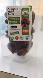 Close-up of organic dry chuware from Punjab farm, showcasing natural, unpolished dry fruits in a rustic setting