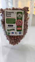 Close-up of fresh, crunchy organic raw peanuts sourced directly from Punjab farm in a rustic bowl
