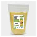 Yellow organic corn flour in a traditional Punjabi kitchen setting, highlighting farm-fresh quality and natural ingredients.