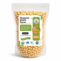 Organic Punjab farm soyabean dal in a rustic bowl, showcasing fresh, unpolished, chemical-free pulses from direct farm sourcing.