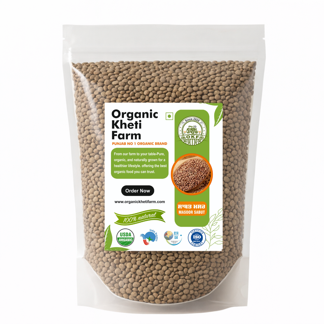 Close-up of organic whole masoor dal with black skin, sourced from Punjab farm, showing natural texture and color