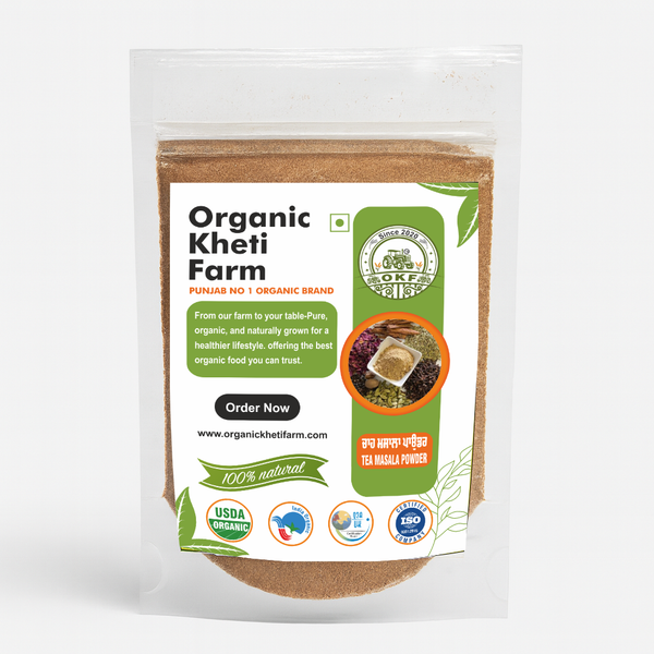 Close-up of organic Punjab farm-sourced tea masala powder in a traditional spice jar with fresh spices around
